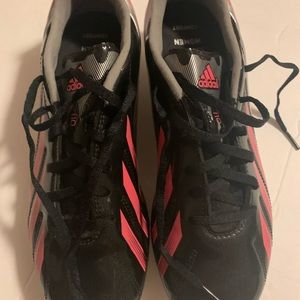Black/pink womens cleats pre owned in good condition